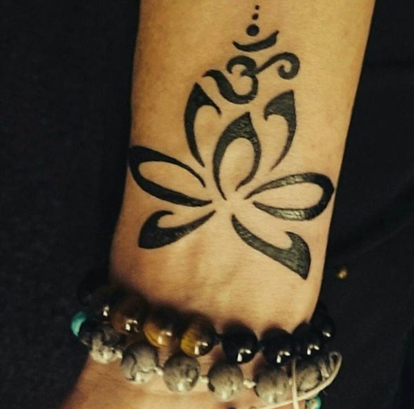 Guest - lotus aum tattoo photo
