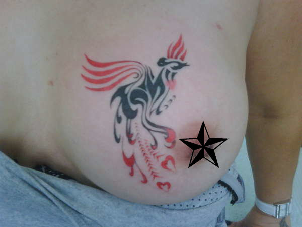 Guest - Tribal phoenix tattoo