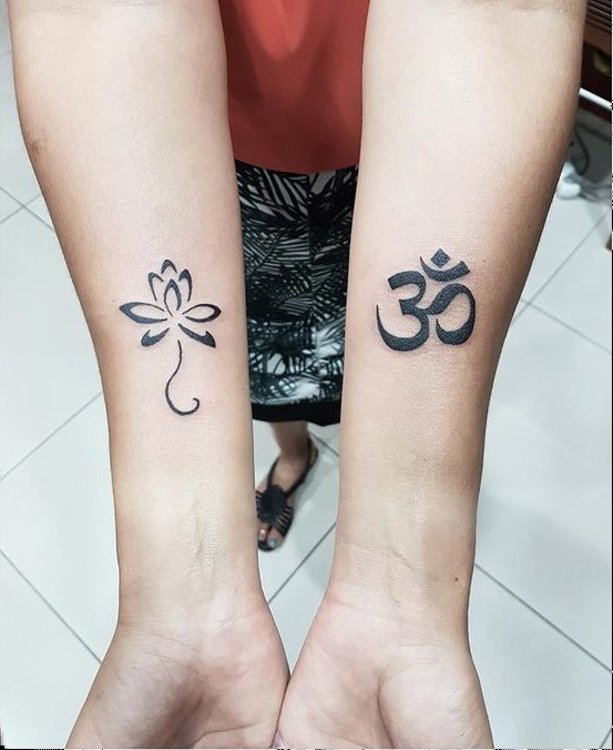 Guest - lotus & aum tattoo photo